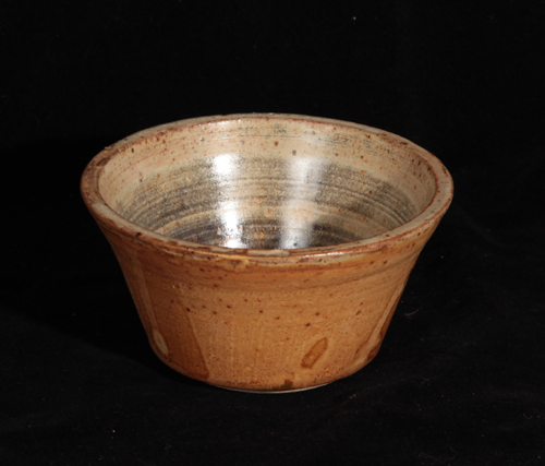 a bowl glazed in ask and rutille