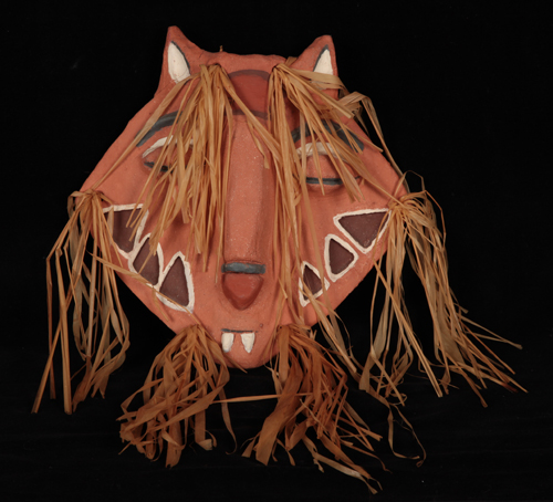 an african inspired,  ceramic lion mask